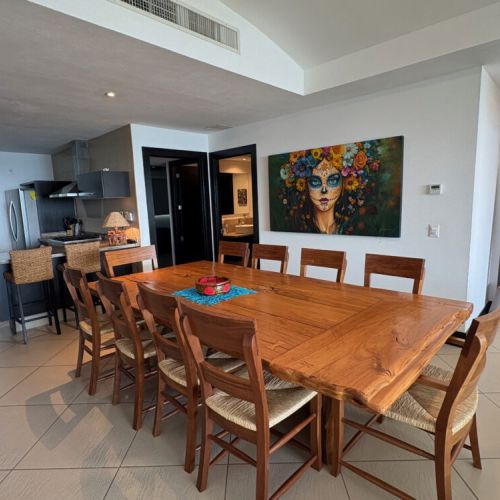 Dining table area, Kitchen and bedroom entrance