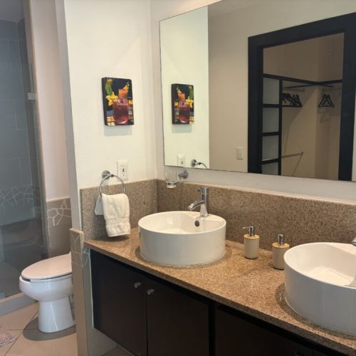 Master ensuite with double sinks and full sized shower