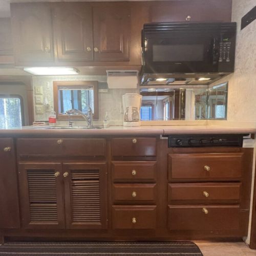 Kitchen sink, New Convection/Microwave Oven and Gas Stove Top