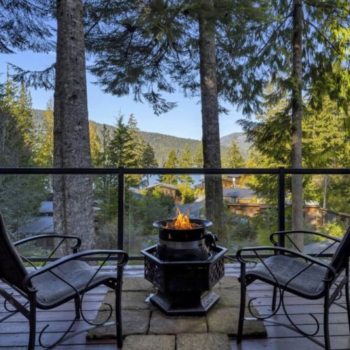 The gas fire pit and view over the Cottage Community and the Bay
