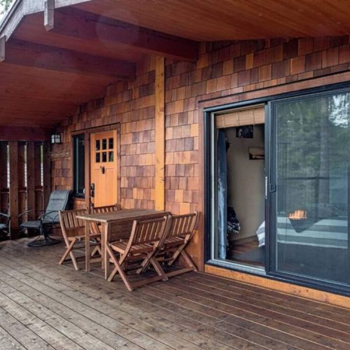 The Cottage entrance and sliding door from the bedroom