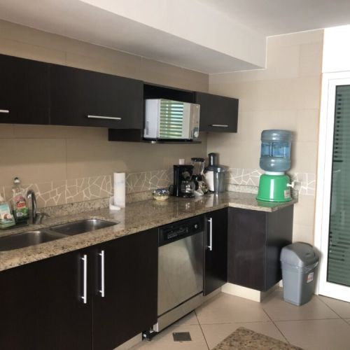 Fully equipped modern kitchen, with water dispenser